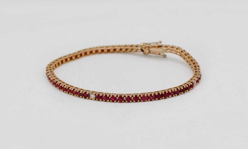 Bracciale modello tennis in oro rosa 750